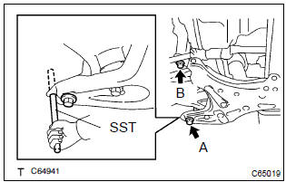 Toyota Corolla.  Install front suspension crossmember sub–assy 