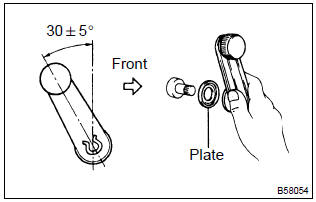 Toyota Corolla. Install front door window regulator handle assy