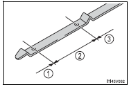 The shape of the dipstick may differ depending on the type of vehicle or engine.