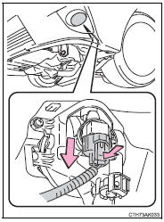 4 Turn the bulb base counterclockwise.