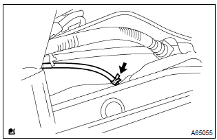 Toyota Corolla. Disconnect fuel tank breather hose