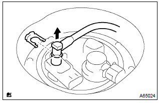 Toyota Corolla. Disconnect fuel tank main tube subassy