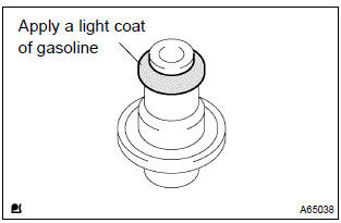 Toyota Corolla.  Install fuel pressure regulator oring