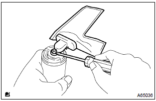 Toyota Corolla. Remove fuel pump filter