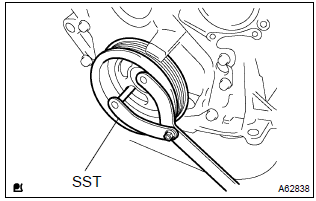 Toyota Corolla. Install flywheel sub–assy