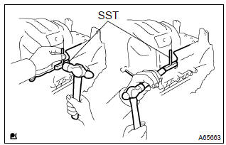 Toyota Corolla. Remove oil pan subassy