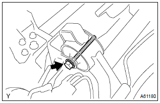 Toyota Corolla. Remove front suspension crossmember w/center member