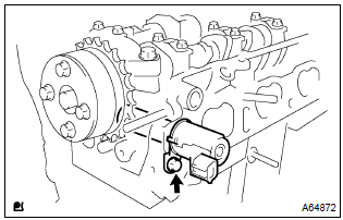 Toyota Corolla. Remove camshaft timing oil control valve assy