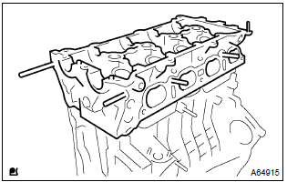 Toyota Corolla. Remove cylinder head subassy
