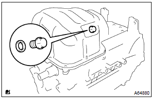 Toyota Corolla.  Remove oil pan drain plug