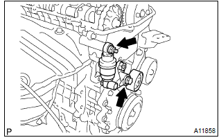 Toyota Corolla. Remove v–ribbed belt tensioner assy