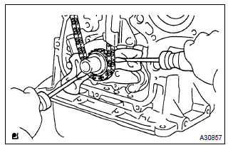 Toyota Corolla.  Remove chain sub–assy