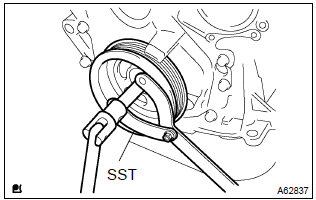 Toyota Corolla. Install crankshaft pulley