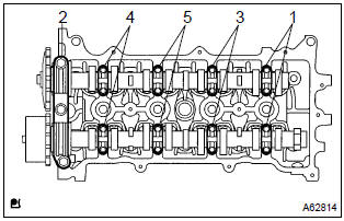 Toyota Corolla.  Remove camshaft