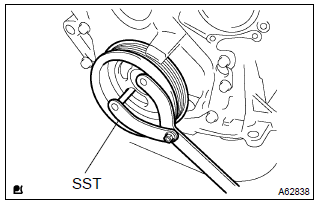 Toyota Corolla. Remove flywheel sub–assy