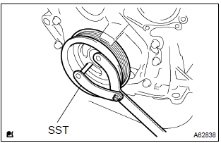 Toyota Corolla. Install flywheel sub–assy