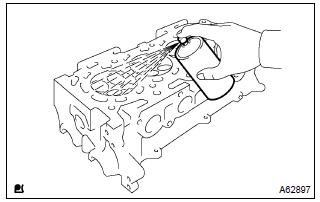 Toyota Corolla. Inspect cylinder head for cracks