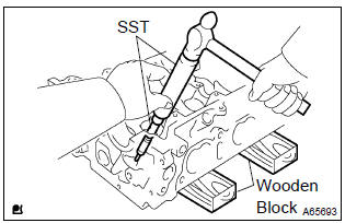 Toyota Corolla. Replace valve guide bushing