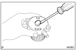 Toyota Corolla.  Remove starter commutator end frame cover