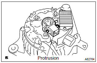 Toyota Corolla. Install generator brush holder assy