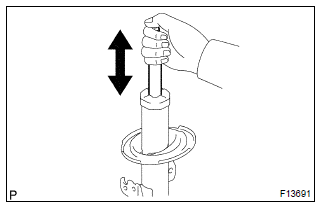 Toyota Corolla.  Inspect shock absorber assy front lh