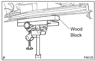 Toyota Corolla. Remove rear shock absorber with coil spring