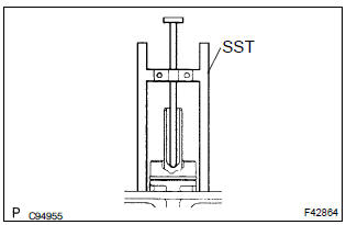 Toyota Corolla. Inspect and adjust brake booster push rod