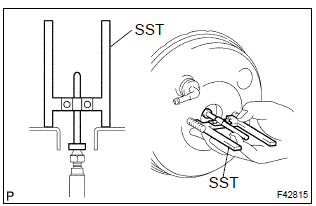 Toyota Corolla. Inspect and adjust brake booster push rod