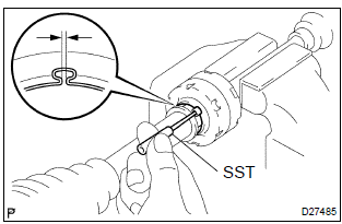 Toyota Corolla.  Install drive shaft damper (rh drive shaft)