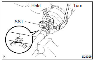 Toyota Corolla.  Install front axle inboard joint boot lh clamp