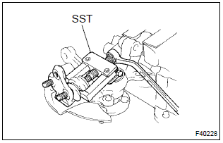 Toyota Corolla. Remove lower ball joint assy front lh