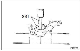 Toyota Corolla.  Install front axle hub lh bearing