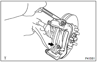 Toyota Corolla.  Remove front disc brake cylinder mounting lh