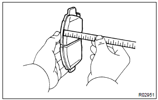 Toyota Corolla. Inspect pad lining thickness