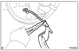Toyota Corolla. Install rear brake shoe