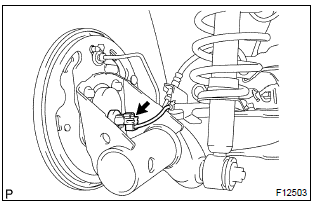 Toyota Corolla. Disconnect skid control sensor wire