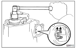 Toyota Corolla. Remove manual transmission output shaft rear set nut