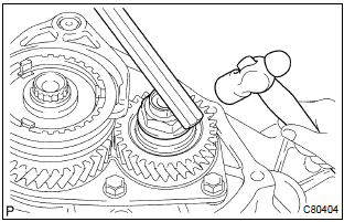 Toyota Corolla. Install manual transmission output shaft rear set nut