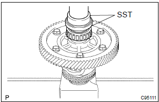 Toyota Corolla.  Install fr differential case rear tapered roller bearing