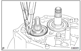 Toyota Corolla.  Install output shaft rear bearing hole snap ring