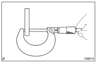 Toyota Corolla.  Inspect 1st gear thrust washer