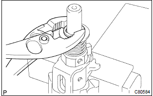 Toyota Corolla. Install select spring seat no.2