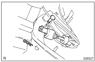 Toyota Corolla. Remove clutch master cylinder push rod clevis w/hole pin