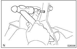 Toyota Corolla.  Remove clutch master cylinder push rod clevis bush