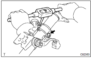 Toyota Corolla.  Remove steering column upper w/switch bracket assy