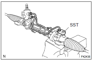 Toyota Corolla. Remove steering left turn pressure tube