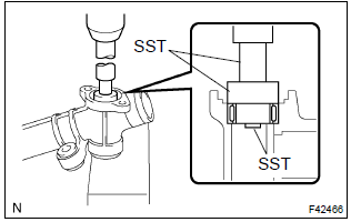 Toyota Corolla. Install power steering control valve lower bearing