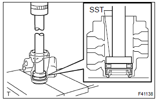 Toyota Corolla. Install power steering control valve upper oil seal