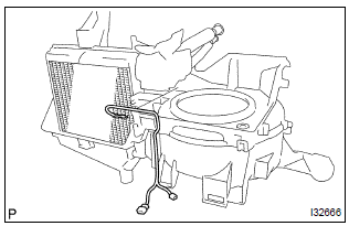 Toyota Corolla.  Remove cooler thermistor