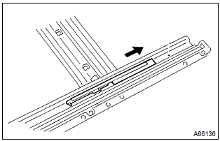 Toyota Corolla. Remove sliding roof drive cable lh